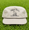 Toledo Hat Co. Sand Dune and Loden Coyote Hat – front view, structured snapback with braided rope brim detail
