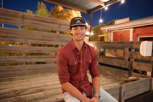 Toledo Hat Co. Black and White Coyote Hat – lifestyle shot outdoors