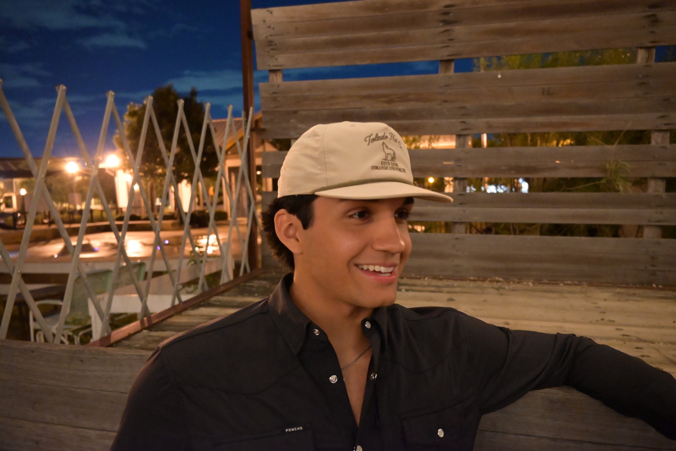 Toledo Hat Co. Sand Dune and Loden Coyote Hat – lifestyle shot outdoors
